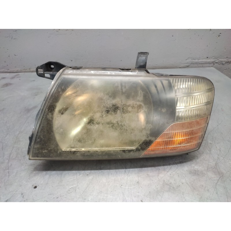 Recambio de faro izquierdo para mitsubishi pajero referencia OEM IAM   